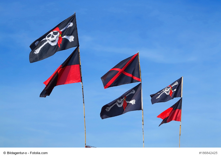 Fahne Flagge der Piraten weißer Totenkopf auf schwarz mit Stab